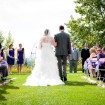 purple wedding - bride walking down aisle