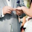 purple wedding - exchanging rings