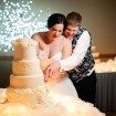 alberta wedding - bride and groom cutting cake