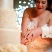 alberta wedding - bride and groom cutting cake