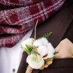 rustic winter shoot with woodsman details - boutonniere