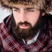 rustic winter shoot with woodsman details - groom