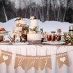 rustic winter shoot with woodsman details - sweets table