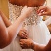 A Dreamy, Whimsical Wedding in Caledon, Ontario - Bridesmaids Helping Bride