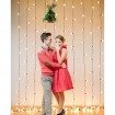 Winter Engagement Photo - mistletoe christmas lights