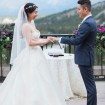 romantic rocky mountain wedding - exchanging rings