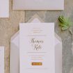 timeless, elegant white wedding in manitoba - wedding invitation