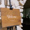 timeless, elegant white wedding in manitoba - welcome sign