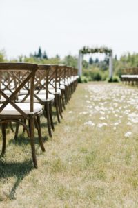 romantic elegant wedding in calgary - ceremony chairs