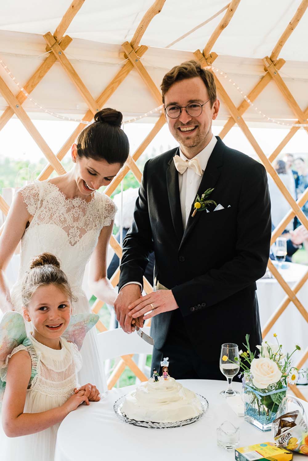 A-Rustic-Backyard-Wedding-in-Nova-Scotia-Cutting the Cake