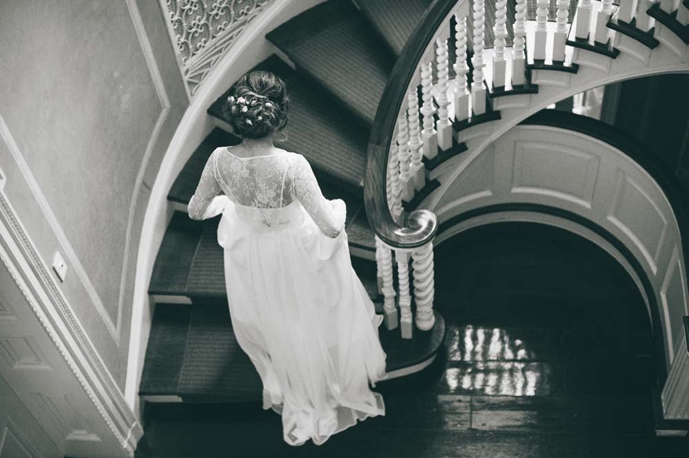 Modern Autumn Botanical Wedding Inspo - Bride on staircase