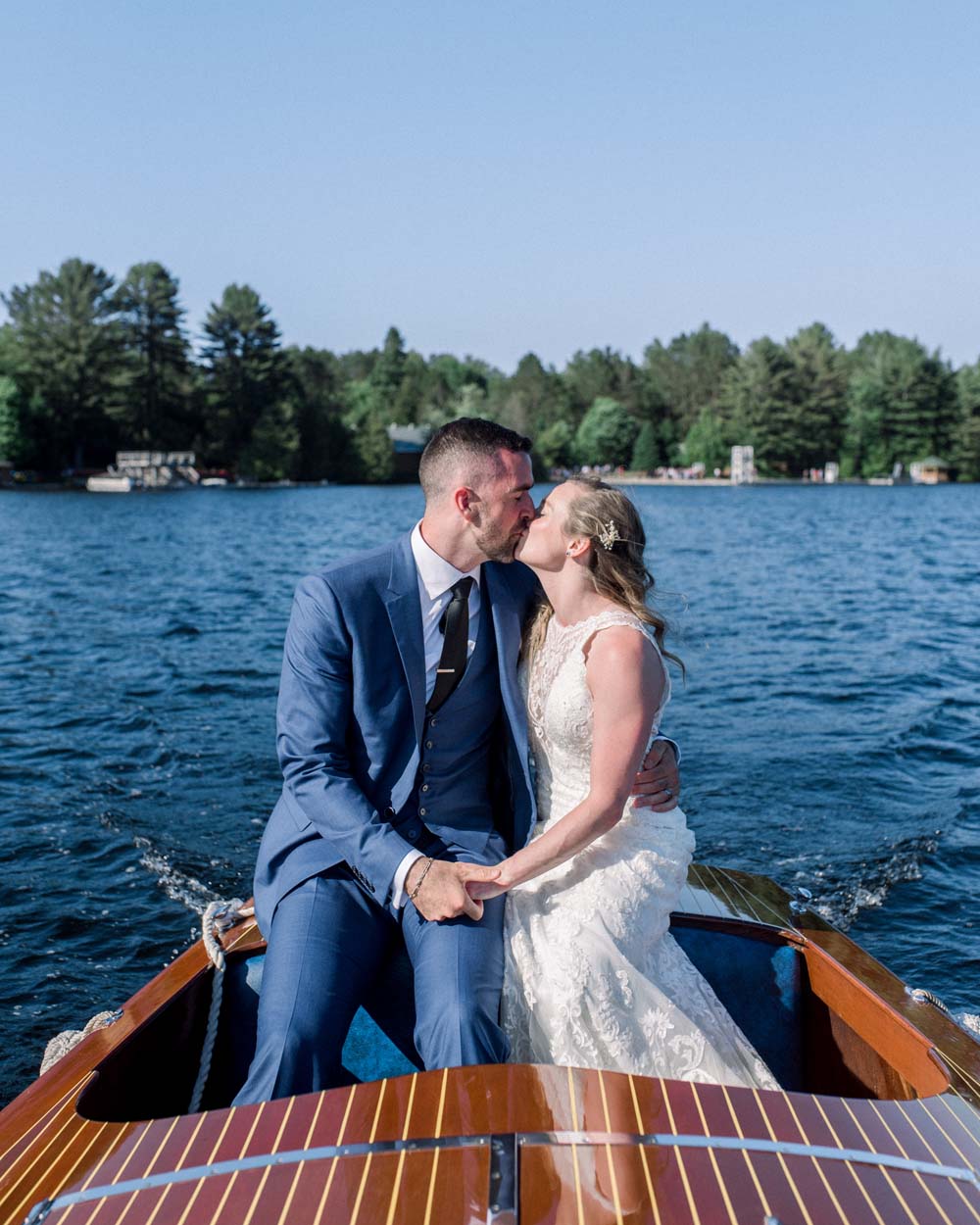 Olympian Rosie McLennan's Cottage Escape Wedding - Boat Kiss